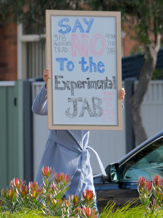 Signage during a Reignite Democracy Australia rally held at Geelong West in July. Picture: Mark Wilson