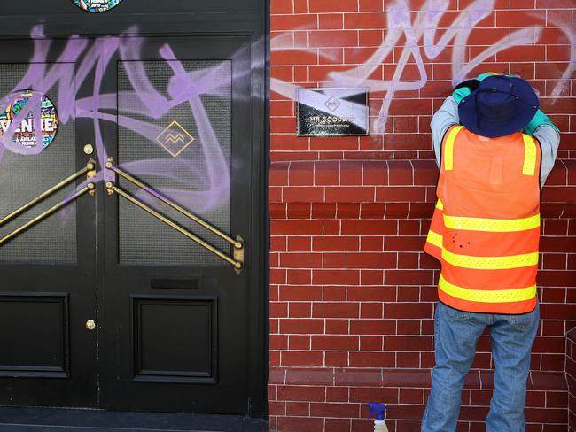 Adelaide City Council Worker Clayton cleaning Graffiti off the front of Dr Good Bar, 12 Union St, Adelaide SA owned by Goran Dedic 0487711166 after A 40-year-old man has was arrested by police after he allegedly was caught on CCTV graffitiing nearly two dozen businesses in AdelaideÕs CBD overnight. (AAP/Emma Brasier)More than 20 Rundle and Union St businesses woke up to graffiti plastered over their buildings following a tagging spree in the early hours of Saturday morning.A Walkerville man, 40, was located by police in Rundle St allegedly in the act of graffitiing a business. He was then arrested.