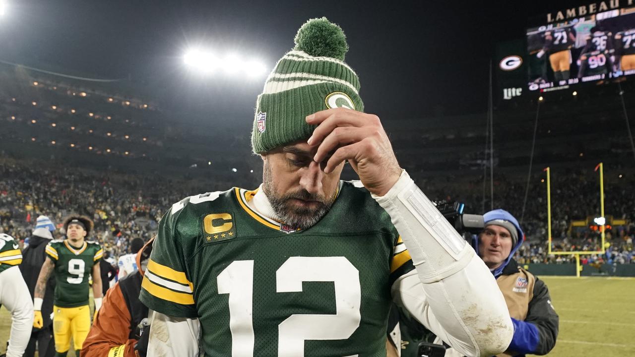 GREEN BAY, WISCONSIN – JANUARY 08: Aaron Rodgers #12 of the Green Bay Packers walks off the field after losing to the Detroit Lions at Lambeau Field on January 08, 2023 in Green Bay, Wisconsin. Patrick McDermott/Getty Images/AFP (Photo by Patrick McDermott / GETTY IMAGES NORTH AMERICA / Getty Images via AFP)