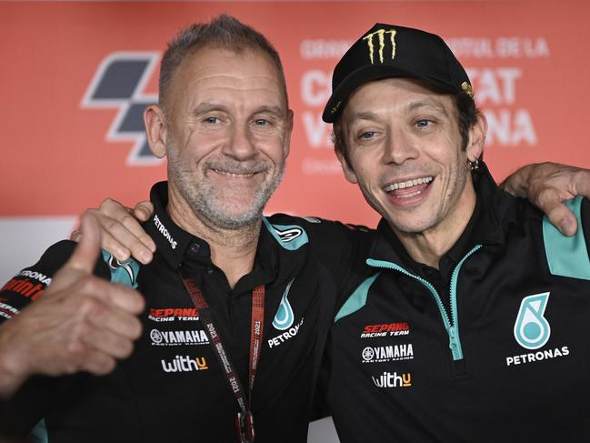 VALENCIA, SPAIN - NOVEMBER 11: Wilko Zeelemberg of Netherland and Petronas Yamaha SRT (L) poses with Valentino Rossi of Italy and Petronas Yamaha SRT  during the "Exceptional press conference with VR46" during the MotoGP of Comunitat Valenciana: Previews at Ricardo Tormo Circuit on November 11, 2021 in Valencia, Spain. (Photo by Mirco Lazzari gp/Getty Images)