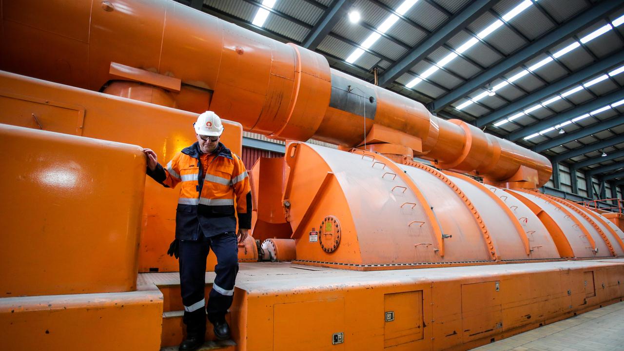 Tony Phillips, Group Manager Operations of Eraring Power Station in NSW, with a steam turbine at the facility. Pic Liam Driver