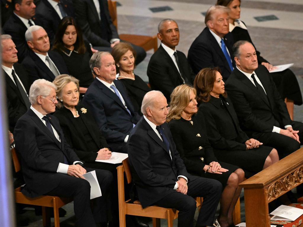 From left to right front row, US President Joe Biden, First Lady Lady Jill Biden, Vice President Kamla Harris, Second Gentleman Doug Emhoff, second row, former President Bill Clinton, former Secretary of State Hillary Clinton, former President George W. Bush, his wife Laura Bush, former President Barack Obama, President-elect Donald Trump and his wife Melania Trump. (Photo by Mandel NGAN / AFP)