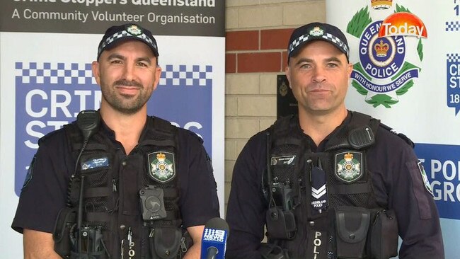 Const Jeremy Gardiol (left) and Sen-Const Kevin Mayo rescued a man trapped inside a vehicle in Gympie in 2018. Picture: Nine News