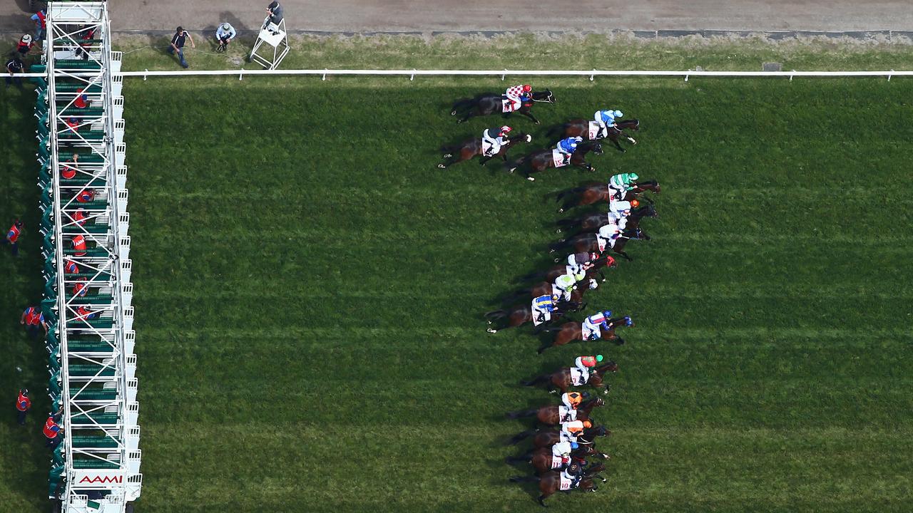 MELBOURNE, AUSTRALIA - NOVEMBER 03: A general view of the start of the AAMI Victoria Derby during Victorian Derby Day at Flemington Racecourse on November 3, 2012 in Melbourne, Australia.  (Photo by Ryan Pierse/Getty Images)