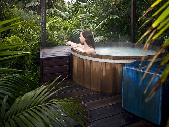 At Capella Lodge, take a bath in the tub amid the lush surrounds of Lord Howe Island. 