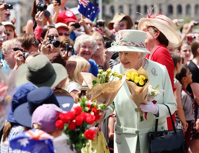 Queen Elizabeth II greets the crowd along the Brisbane River on October 24, 2011. Picture: Jodie Richter-Pool/Getty Images