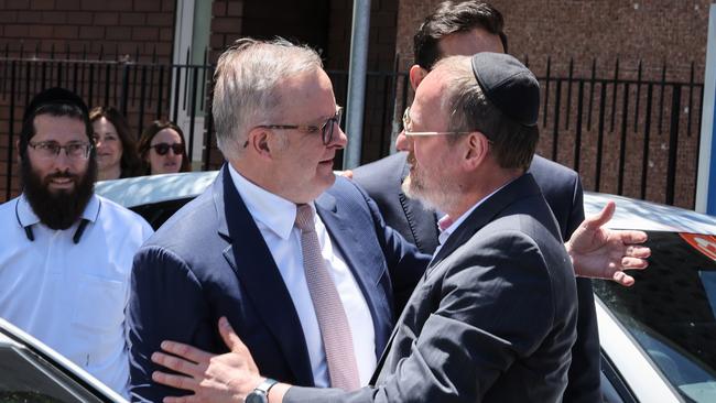 Anthony Albanese is greeted by Jewish community leaders as he visits the fire damaged Adass Israel Synagogue in Ripponlea, Melbourne. Picture: David Caird