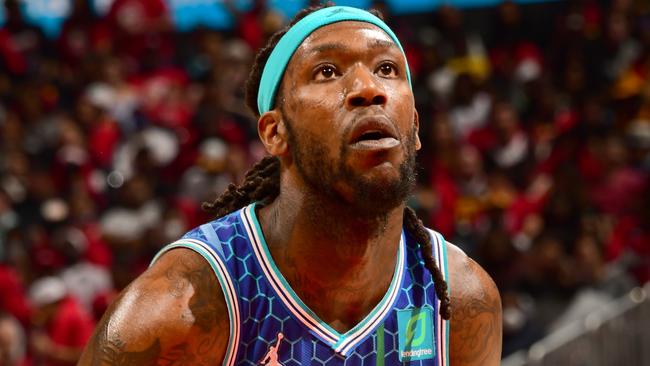 ATLANTA, GA - APRIL 13: Montrezl Harrell #8 of the Charlotte Hornets prepares to shoot a free throw during the game against the Atlanta Hawks during the 2022 Play-In Tournament on April 13, 2022 at State Farm Arena in Atlanta, Georgia.  NOTE TO USER: User expressly acknowledges and agrees that, by downloading and/or using this Photograph, user is consenting to the terms and conditions of the Getty Images License Agreement. Mandatory Copyright Notice: Copyright 2022 NBAE (Photo by Scott Cunningham/NBAE via Getty Images)