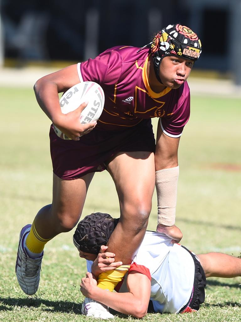 Boys Rugby League State Championship held at Northern Division, Brothers Leagues ground, Townsville. Northwest (maroon) v Wide Bay (white) 14-15 years. Samson Kelemete of Kirwan SHS.