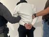 Wanted man captured ‘hiding’ behind door at resort
