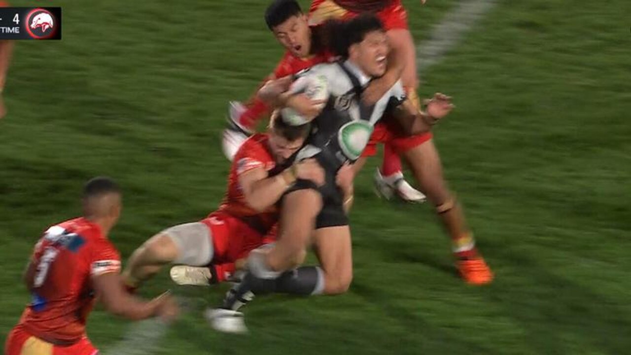 Euan Aitken avoids a penalty for a possible hip drop tackle on Dallin Watene-Zelezniak. Picture: Fox League.