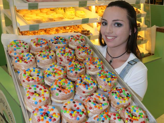 Mind the carbs: Laura Mogridge at Doughnut Time in Brisbane’s  Indooroopilly. Picture: Glenn Barnes