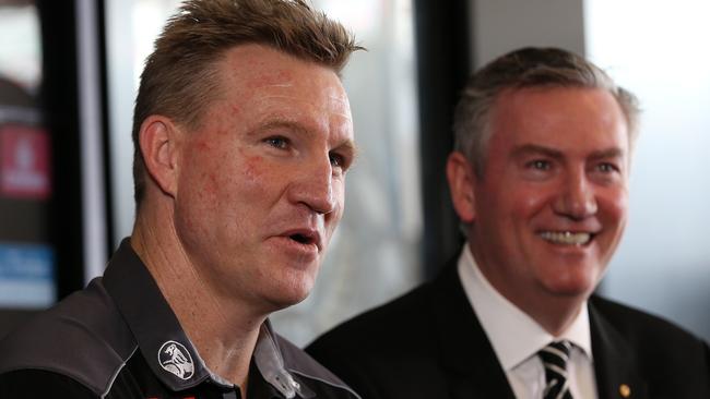 Buckley and McGuire all smiles after the Magpies coach signed a two-year extension last year. Picture: Michael Klein