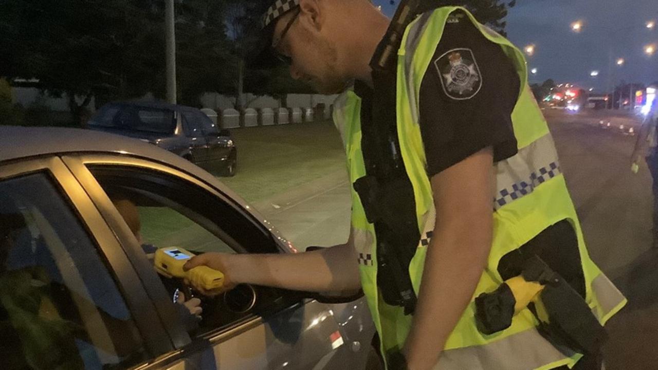 A Toowoomba officer conducts a breath test during Operation Anticline on January 22.