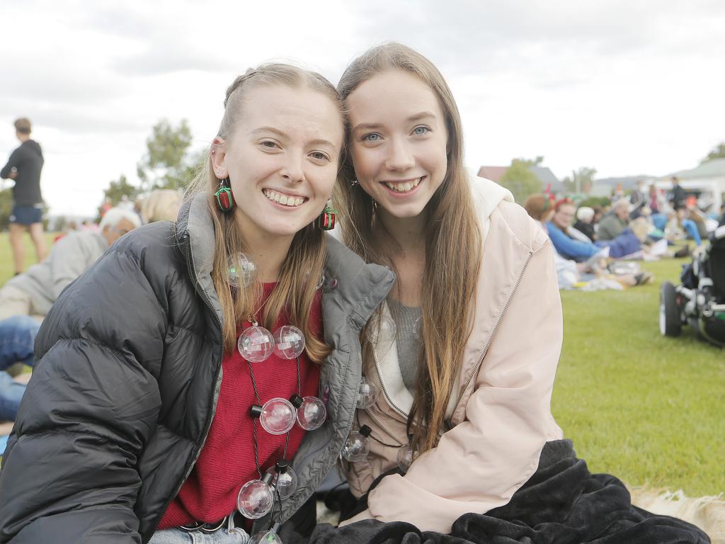 SOCIALS Ella Dodge of Old Beach, left, and Olivia Powel of Howrah at the Carols on the Hill, Guilford Young College, West Hobart. Picture: MATHEW FARRELL