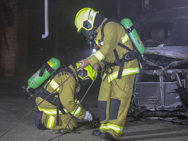 Six people were found living in garages after emergency services were called to a car fire in Blacktown. Picture: Dean Asher