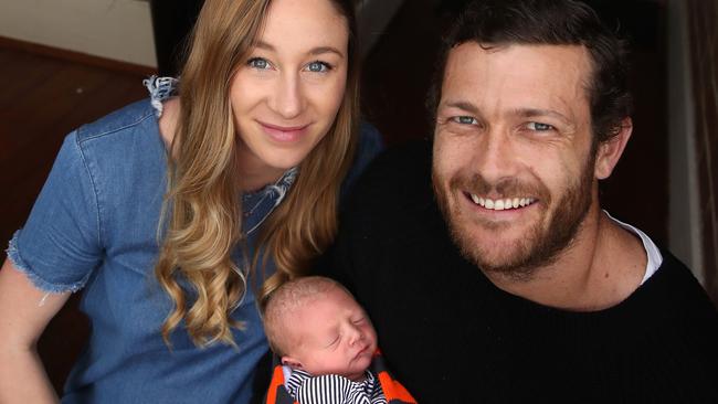 Sam Reid with his wife Elissa and newborn baby boy Elijah. Picture: Phil Hillyard