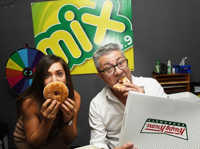 Greg Vincent and Ali Burton from 104.9 have flown up hundreds of krispy kream donuts are will be giving them away for free this Thursday at the Darwin Showgrounds.  Pic Katrina Bridgeford.