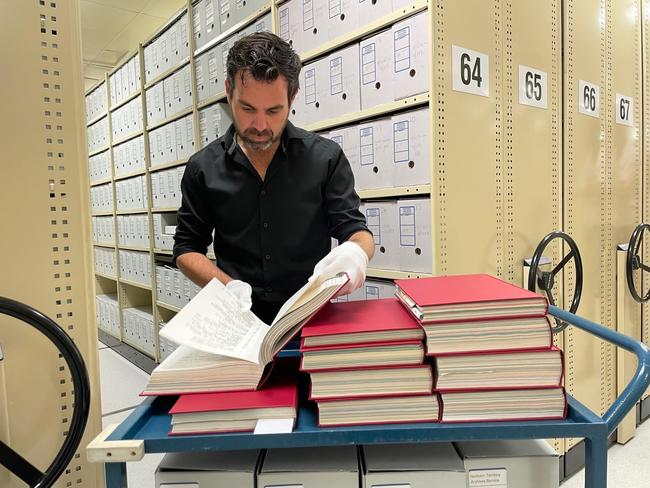 Attorney-General Chansey Paech inspects the 1992 cabinet records at the NT archives.