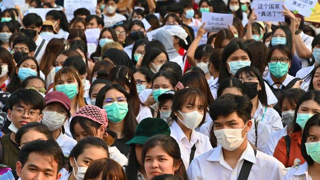 Students wear protective face masks, amid fears over the spread of the COVID-19 coronavirus, as they take part in a protest in Thailand. Picture: AFP