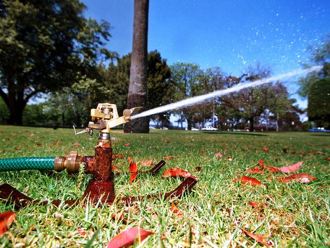 29 Oct 2002 - Sprinkler on in South Parklands, Adelaide. sprinklers watering water gardening generic