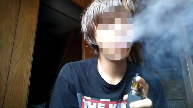 A young boy seen using their vape with cannabis in one of the videos viewed by UQ researchers. Picture: Supplied/ YouTube.