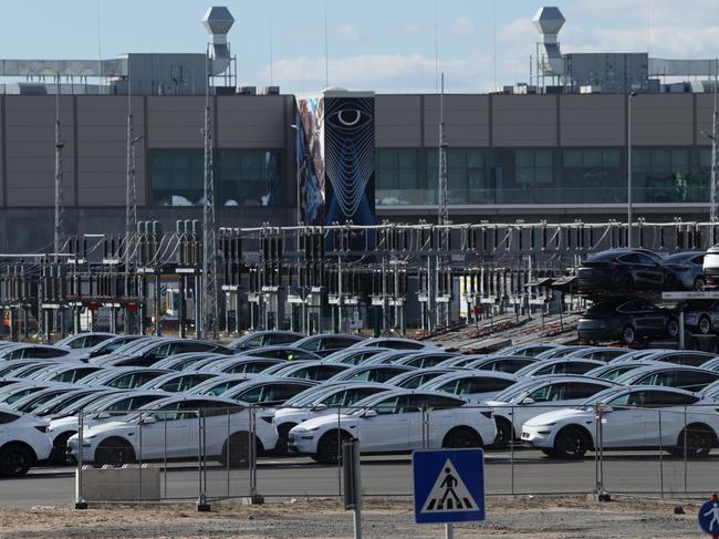 New Tesla electric cars, including the new 2025 Model Y, stand at the Tesla Gigafactory Berlin-Brandenburg. Picture: Getty