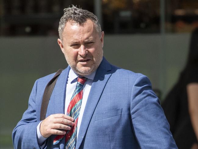 Lawyer Adam Magill is seen arriving at the Brisbane Magistrates Court in Brisbane, Wednesday, January, 2020. Magill, a criminal lawyer, is appearing in court for a mention relating to four charges of breaching his bail. (AAP Image/Glenn Hunt) NO ARCHIVING