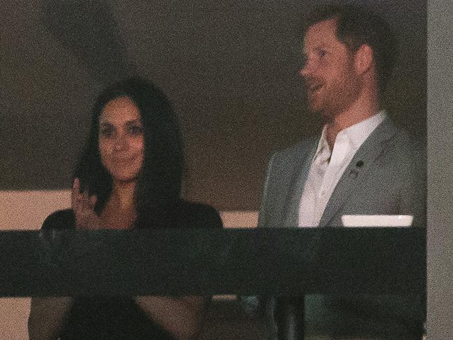 Prince Harry stands with girlfriend Meghan Markle during the Invictus Games closing ceremony in Toronto. Picture: AP