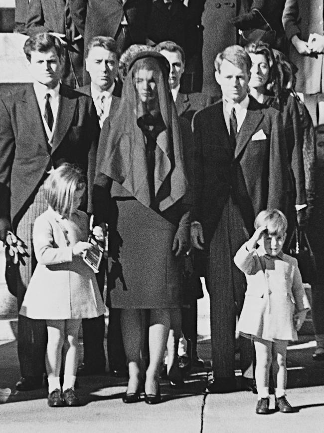 Kennedy Jnr, aged three, saluting his father’s coffin in 1963 with his sister Caroline, mother Jacqueline and uncles (from left) Ted and Bobby. (Picture: Keystone/Getty Images)