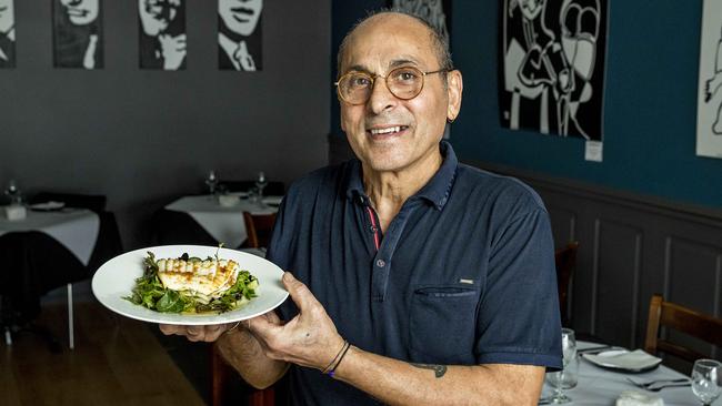 That Italian Place owner and chef Antonino Ieracitano holding calamari. Picture Jerad Williams