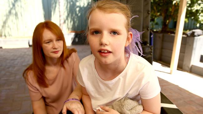 Helen Owen with her daughter Bella, who experiences hundreds and thousands of cluster seizures for minutes or hours on a daily basis. Picture: Justin Sanson