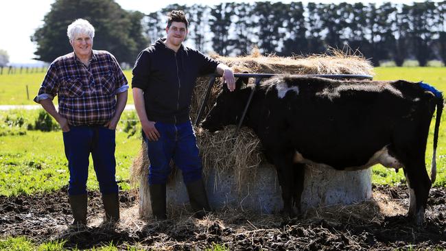 Long-time Murray Goulburn suppliers Jim Munro with his son Jono on their property at Camperdown in Western Victoria. Pic: Aaron Francis
