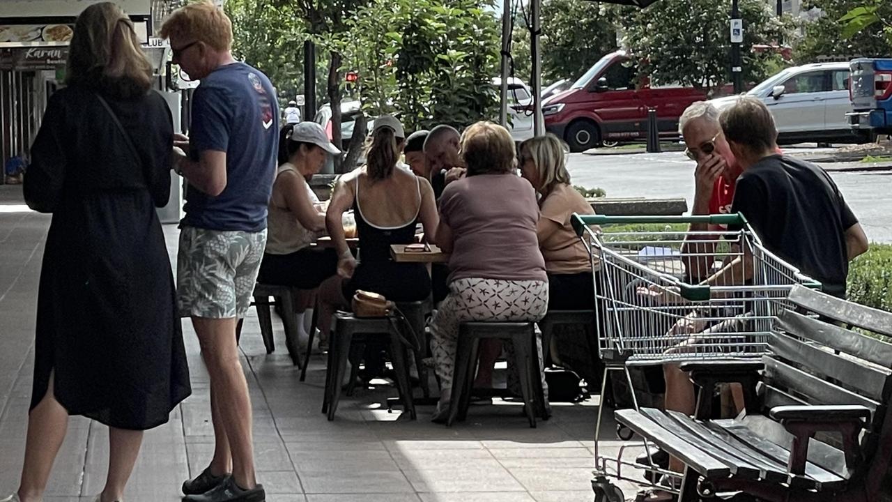 Toowoombaites taking advantage of a bright, sunny morning on New Year's Eve to take in breakfast and coffee in the CBD.