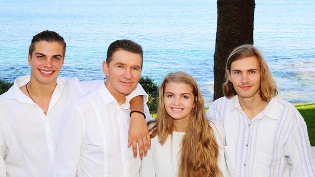 Dr Jim Ferry with his children Anton, Annika and Christian. Picture: Manly Daily