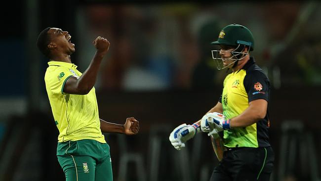 Lungi Ngidi (left) celebrates taking Finch’s wicket. Picture: Getty