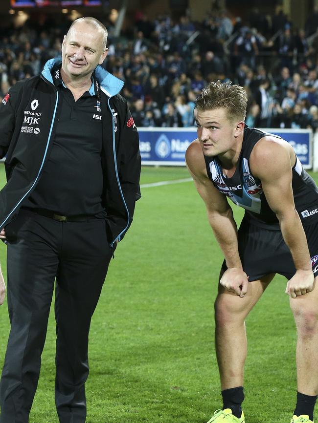 Ken Hinkley with Ollie Wines after a win. Picture Sarah Reed