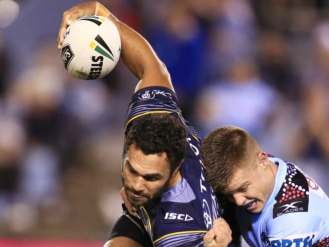 the Cowboys' Justin O'Neill tackled   during the Cronulla Sharks v North Queensland Cowboys NRL round 11  game at Southern Cross Group Stadium, Cronulla. pic Mark Evans