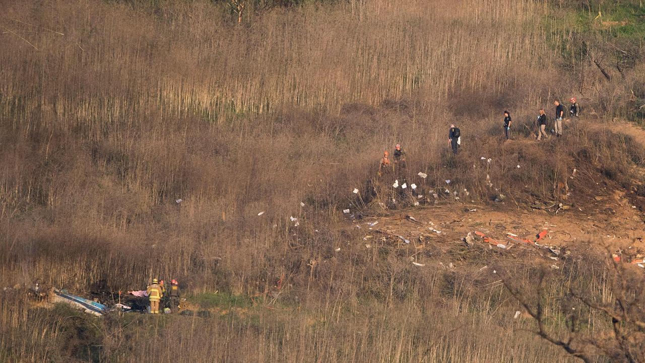 Firefighters and police were then the first to reach the scene. Picture: AFP/Mark Ralston.