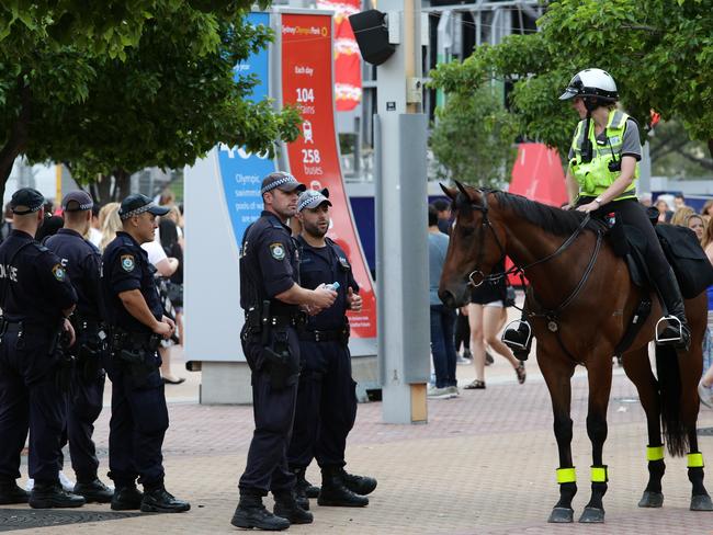 Even with a massive police presence there were still plenty of people who thought they could get past it. Picture: Jonathan Ng