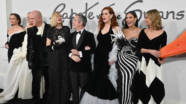 From left: Diane Lane, Chloe Sevigny, Ryan Murphy, Naomi Watts, Tom Hollander, Molly Ringwald, Demi Moore andss Calista Flockhart arrive for the Feud: Capote vs. The Swans premiere at the Museum of Modern Art in New York. Picture: AFP