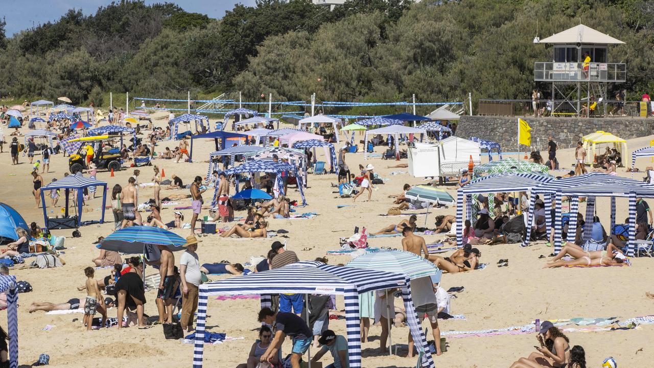 Hundreds of people flock to Mooloolaba Beach on a hot day, but one British expat feels it’s ‘not acceptable’ to wear a bikini. Picture Lachie Millard