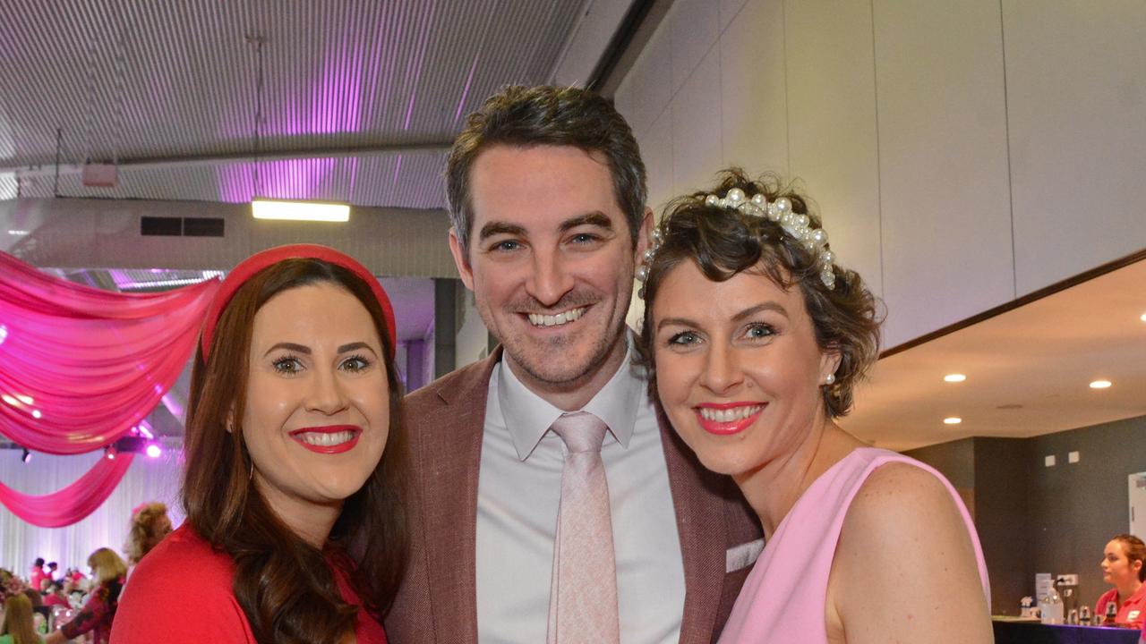 Sian Ogge, James Barritt and Sarah Jolly at Pink Ribbon Race Day in the Events Centre, GCTC Bundall. Pic: Regina King