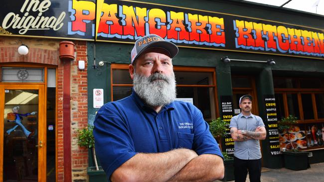 Pancake Kitchen owner Mark Sandgren with general manager Josh Whitford outside the CBD venue in 2020, at the height of Covid lockdowns. Picture: Mark Brake