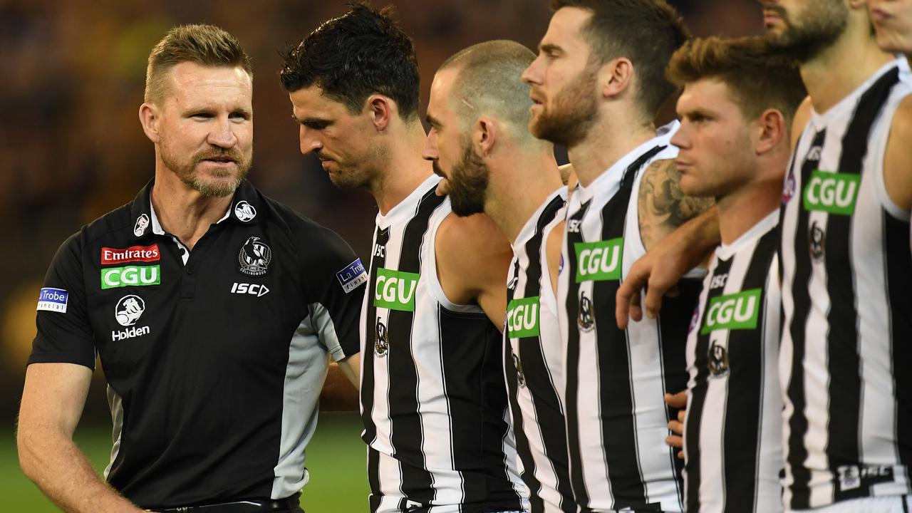 Collingwood coach Nathan Buckley with his players before last Friday night.