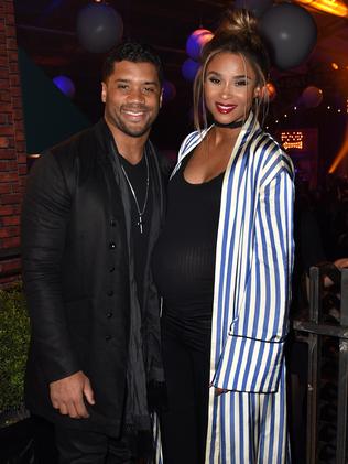 Ciara and husband, NFL star, Russell Wilson at the Warner Music bash. Picture: AFP