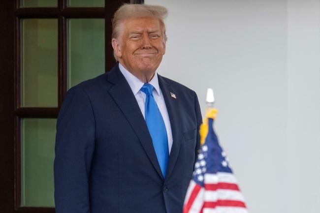 US President Donald Trump smiles at the White House