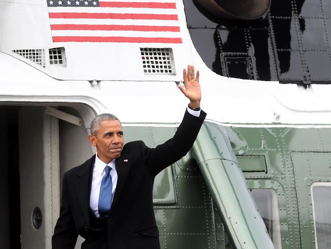 Former President Obama waves from the helicopter he departs the US Capitol after inauguration ceremonies in Washington, DC, on January 20. Picture: AFP