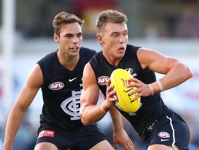 MELBOURNE, AUSTRALIA - FEBRUARY 28: Patrick Cripps of the Blues runs with the ball during the 2019 JLT Community Series AFL match between the Carlton Blues and the Essendon Bombers at Ikon Park on February 28, 2019 in Melbourne, Australia. (Photo by Scott Barbour/Getty Images)