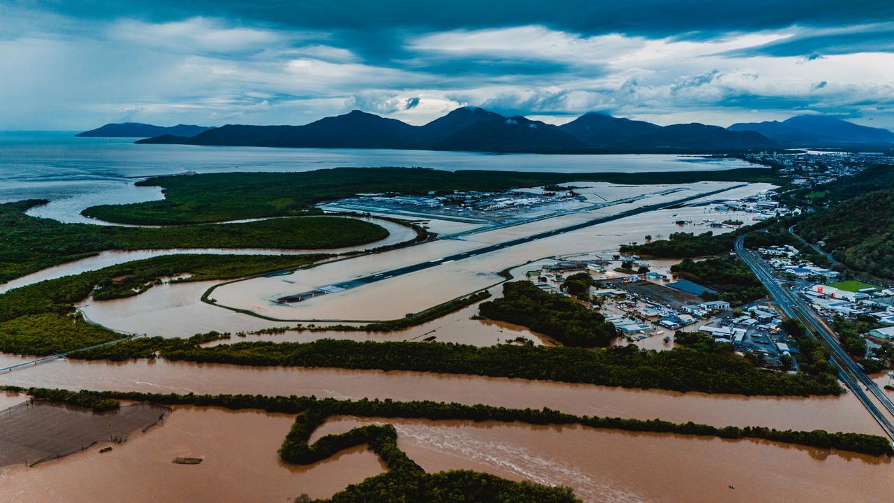 Cairns Airport and surrounds are underwater after the Barron River burst its banks. Picture: Liv Cole